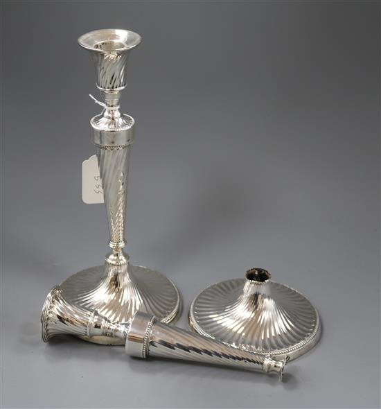 A pair of George III silver candlesticks (marks rubbed and one a.f.), 28.5cm.